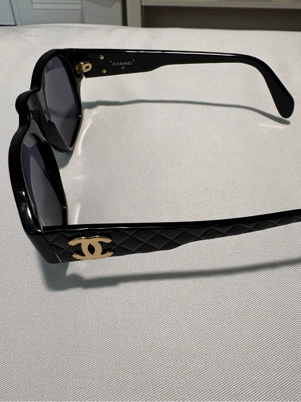 CHANEL Black Quilted Temple Sunglasses with Gold CC Accent